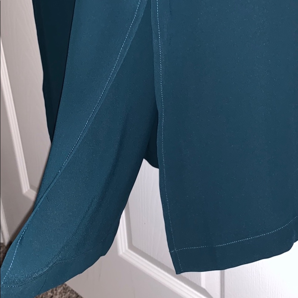 Emerald green dress with a low v cut in the front - Picture 4 of 5